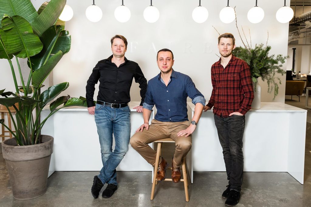 Marcelo Cortes stands next to Daniele Perito and Max Rhodes in the Faire office.